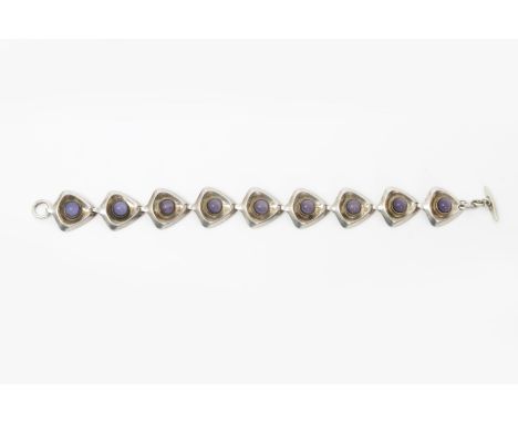  A Danish silver link bracelet by Herman Siersbol, the cast triangular sections set with amethyst stones, stamped 925S HS to 