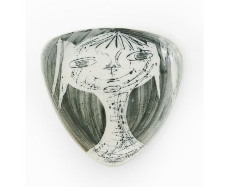 A Richard Parkinson Pottery School Girl plate designed by Susan Parkinson, triangular section, resist decorated in blue on a