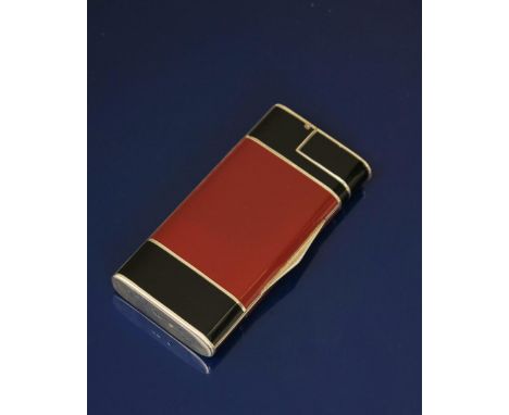  A rare Alfred Dunhill silver and enamel cigarette case and lighter combination, the hinged cigarette compartment enamelled r