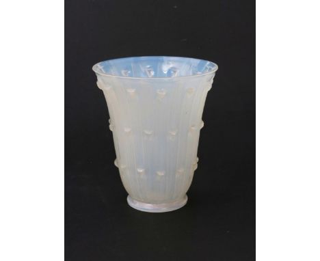  'Bellis' no. 1097 a Lalique opalescent glass vase designed by Rene Lalique, stencil R Lalique, 14cm. high Catalogue Notes Th
