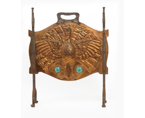  An Arts and Crafts copper and wrought iron firescreen possibly retailed by Liberty & Co, the rectangular panel stamped in re
