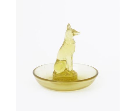  'Chien' no.290 a Lalique amber glass cendrier designed by Rene Lalique, etched R Lalique France 10cm. diam. Catalogue Notes 