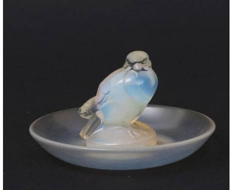  'Moineau' no.284 a Lalique opalescent glass cendrier designed by Rene Lalique, stencil R. Lalique, 9cm. diam. Catalogue Note