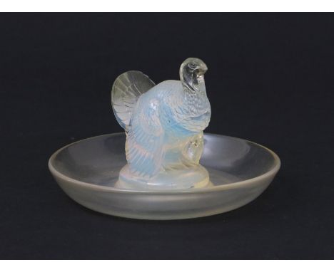 'Dindon' no.287 a Lalique opalescent glass cendrier designed by Rene Lalique, etched R Lalique France, 9.5cm. diam. Catalogu