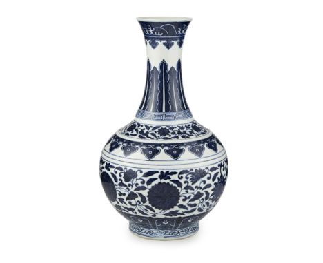 BLUE AND WHITE BOTTLE VASE  GUANGXU SIX-CHARACTER MARK AND OF THE PERIOD   the globular body decorated with composite flowerh