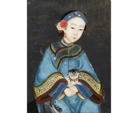 REVERSE GLASS PAINTING OF A LADY HOLDING A PUPPY  QING DYNASTY, late 19th century delicately painted with a portrait of a you