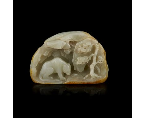 CARVED CELADON JADE BOULDER  worked on one side with a tiger in a rocky setting arboured with a large pine tree, the jagged m