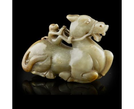 CARVED JADE 'MONKEY AND PIXIU' GROUP  playfully carved with a monkey atop a pixiu and reining in the double-horned mythical b