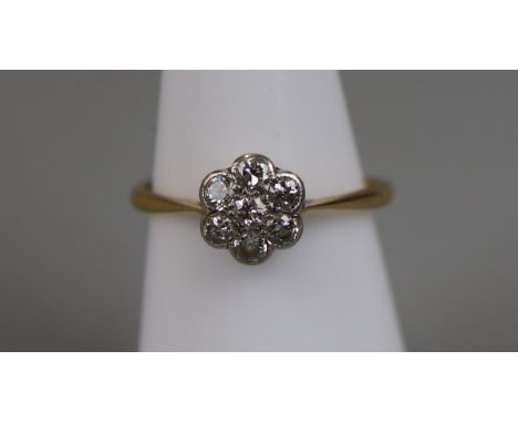 18ct gold diamond daisy ring with platinum setting (size M¼)