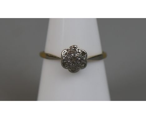 18ct gold diamond daisy ring (size N½)