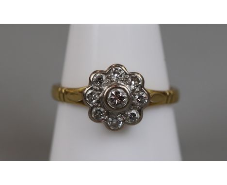 18ct gold diamond set daisy ring (size P½)