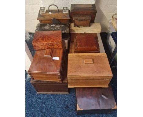 A collection of wooden boxes tea caddy and sewing box.