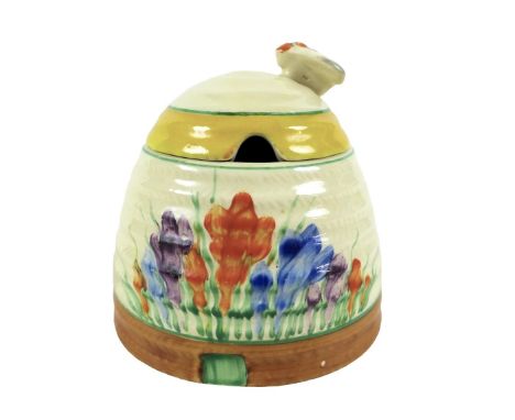 A Clarice Cliff crocus pattern bee-hive preserve pot, 10cm diameter by 10cm high. 