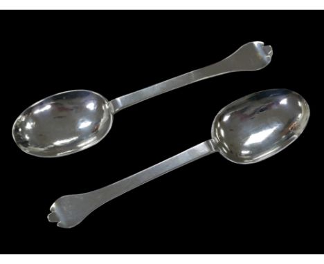 Two James II silver trefid spoons, one inscribed 'I P E' to the reverse of its finial, some remnants of gilt covering, 19.5cm