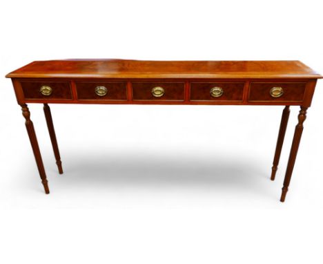 A new walnut five drawer hall table on turned reeded legs, 156 by 32 by 76cm high. 