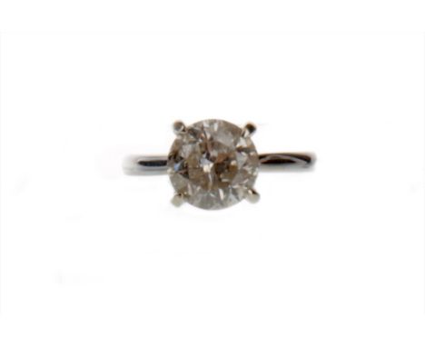 DIAMOND SOLITAIRE RING, the round brilliant cut diamond of 3.01 carats, in eighteen carat gold, size M, 4.7g