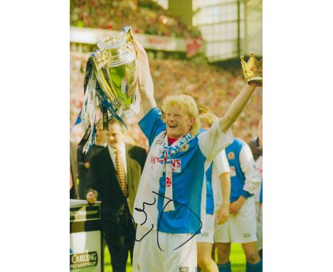 Colin Hendry signed 12x8 inch colour photo pictured celebrating with the Premier league trophy while playing for Blackburn Ro