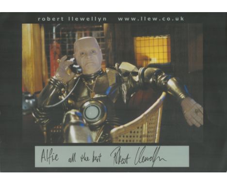 Robert Llewellyn signed 11. 75 x8. 25 inch colour photo. Promo. Red Dwarf Robot. Dedicated. Good. Good condition Est.