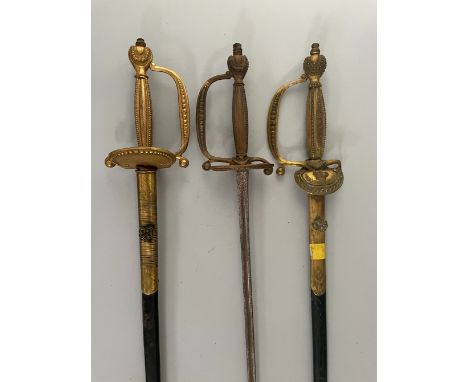 THREE BRITISH COURTSWORDS, EARLY 20TH CENTURY the first with etched blade, gilt brass hilt cast with beadwork including downt