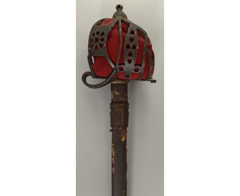 A HIGHLAND BASKET-HILTED BROADSWORD, 20TH CENTURY with broad double-edged fullered blade, iron basket-guard formed of alterna