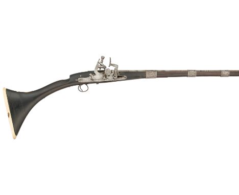 ˜ A 14 BORE NORTH MOROCCAN SNAPHAUNCE MUSKET, 19TH CENTURY, PROBABLY TÉTOUAN with tapering sighted multi-stage barrel retaine