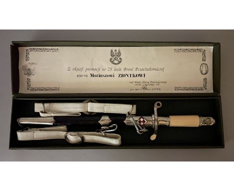 A CASED POLISH MODEL 1954 AIRFORCE DAGGER WITH PRESENTATION INSCRIPTION of regulation type, the blade numbered 32461, chromed