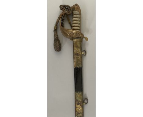 AN 1845 PATTERN NAVAL OFFICER’S SWORD RETAILED BY GIEVES, PORTSMOUTH, POST 1902 with etched blade including a fouled anchor a