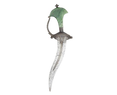 A SOUTH INDIAN DAGGER (KHANJARLI), 16TH/17TH CENTURY with recurved blade formed with a pair of slender fullers and reinforced