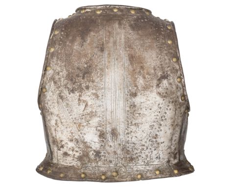 A NORTH EUROPEAN BACKPLATE, SECOND QUARTER OF THE 17TH CENTURY PROBABLY FLEMISH formed in one piece with a slightly upstandin