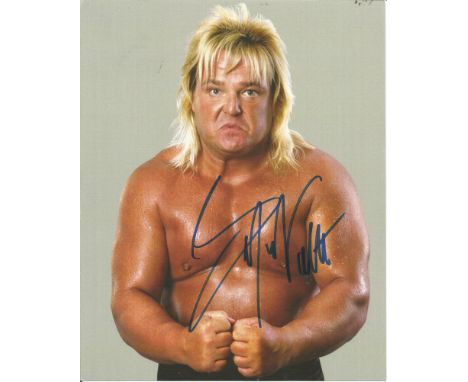 Lot of 4 WWF Wrestling hand signed 10x8 photos. This beautiful set of 4 hand signed WWF Wrestling photos consists of Greg The