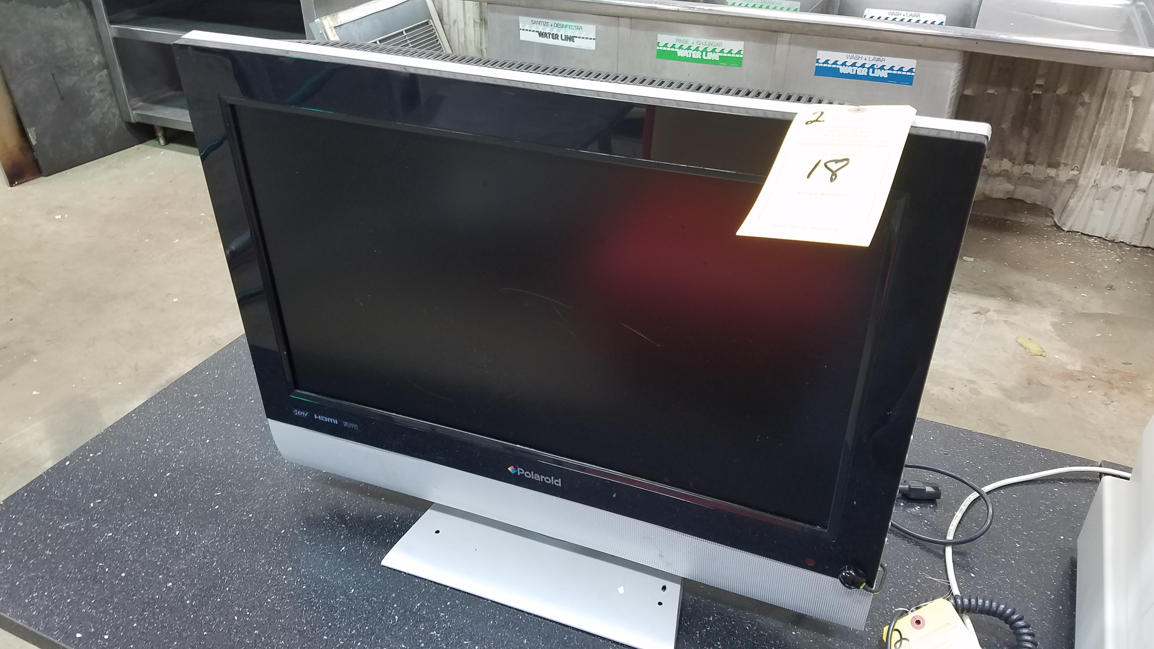 POLAROID COLOR FLAT PANEL TV; MODEL TDX02611C W/DVD PLAYER (LOCATED AT