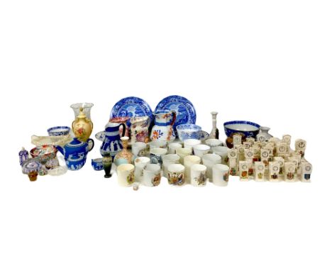 A collection of crested ware and other ceramics, including Arcadian and Carlton crested ware, mostly in the form of Grandfath