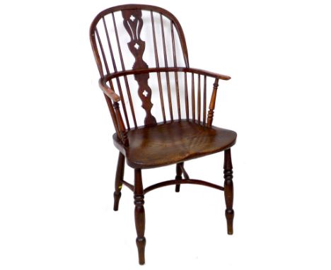 A George III oak 'Lincolnshire' Windsor armchair, workshop of Roger Taylor, Grantham, with high back supported on a pierced s