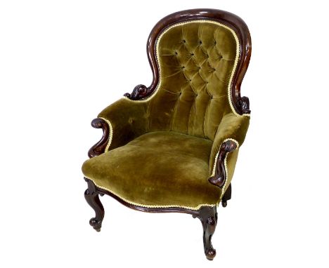 A Victorian mahogany show frame armchair, button back, upholstered in brown velvet, 72.5 by 73.5 by 102.5cm high. 