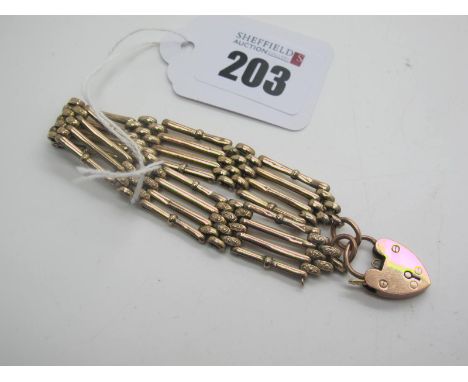 A Gate Link Style Bracelet, stamped "9ct", to a heart shape padlock style clasp stamped "9ct" (lacking safety chain) (overall