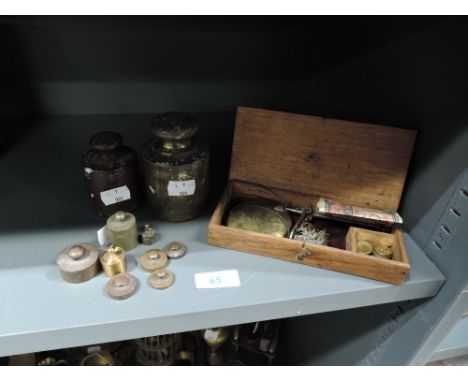 A selection of various brass cast postal scale weights