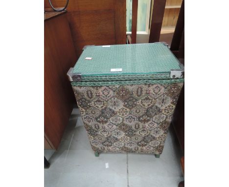 A vintage woven fibre linen basket, labelled Belvoir