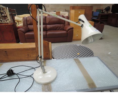 A vintage angle poise lamp