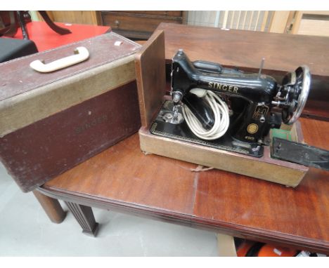 A vintage sewing machine in case