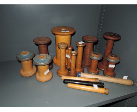 A selection of industrial mill and factory bobbins including Wilkinson Heysham