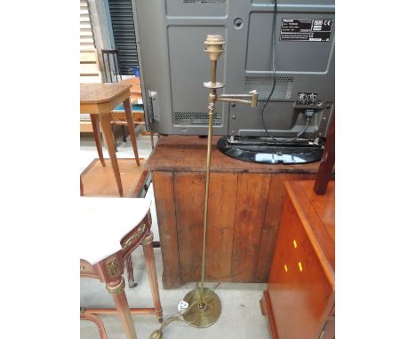 A modern brass standard lamp