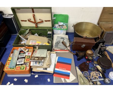 A collection of coins and stamps together with matchboxes, cauldron, costume jewellery, opera glasses, Voigtlander camera etc
