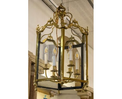 HALL LANTERN, Louis XVI design, brass of hexagonal form with glass panels and six lights, 79cm H x 49cm W excluding chain. 