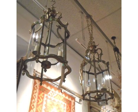HALL LANTERNS, a pair, brass with a triform lamp inside and glazed panels, 65cm drop x 29cm W. (2) (with faults)