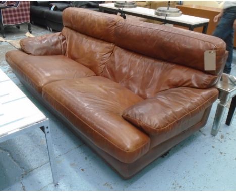 SOFA, two seater, in tanned leather, 210cm L x 115cm W x 85cm H.