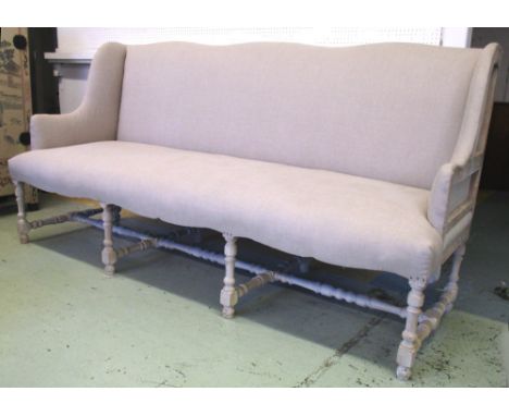 SOFA, Louis XV style, painted with fawn upholstery and wing back on stretched legs, 227cm W. 