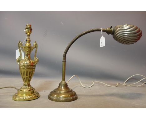 A vintage brass desk lamp with shell shade, together with a brass lamp of urn form 