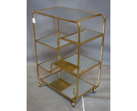 An Art Deco style gilt metal trolley, with 5 mirrored tiers, raised on castors, H.90 W.65 D.36cm 