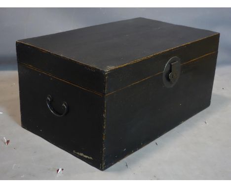 An early 20th century Chinese black lacquered trunk, H.40 W.84 D.49cm 
