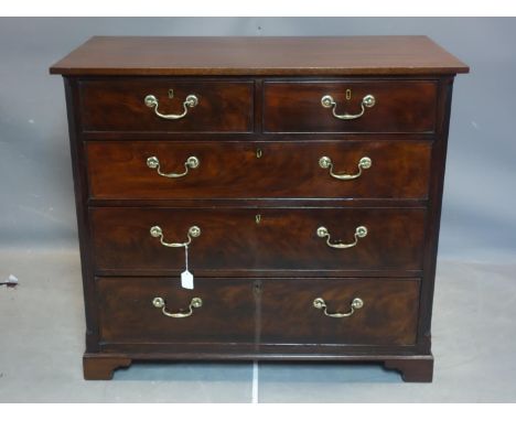 A mahogany chest of two short over three long drawers, on bracket feet, H.96 W.109 D.58cm 
